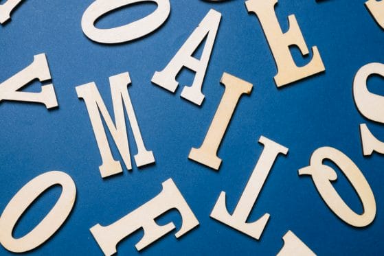 wooden characters blue background